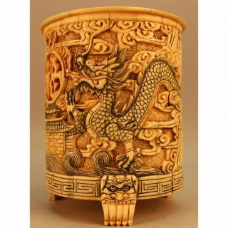 Appraisal: Footed Chinese Bone Brush Pot with carved dragons surrounding the