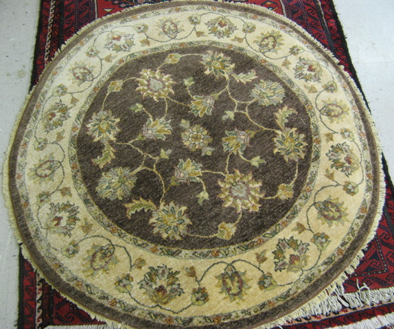 Appraisal: ROUND PAKISTANI-PERSIAN AREA RUG ' diameter