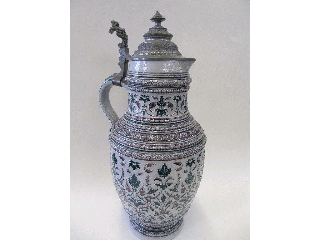 Appraisal: Large German stoneware beer stein with pewter lid