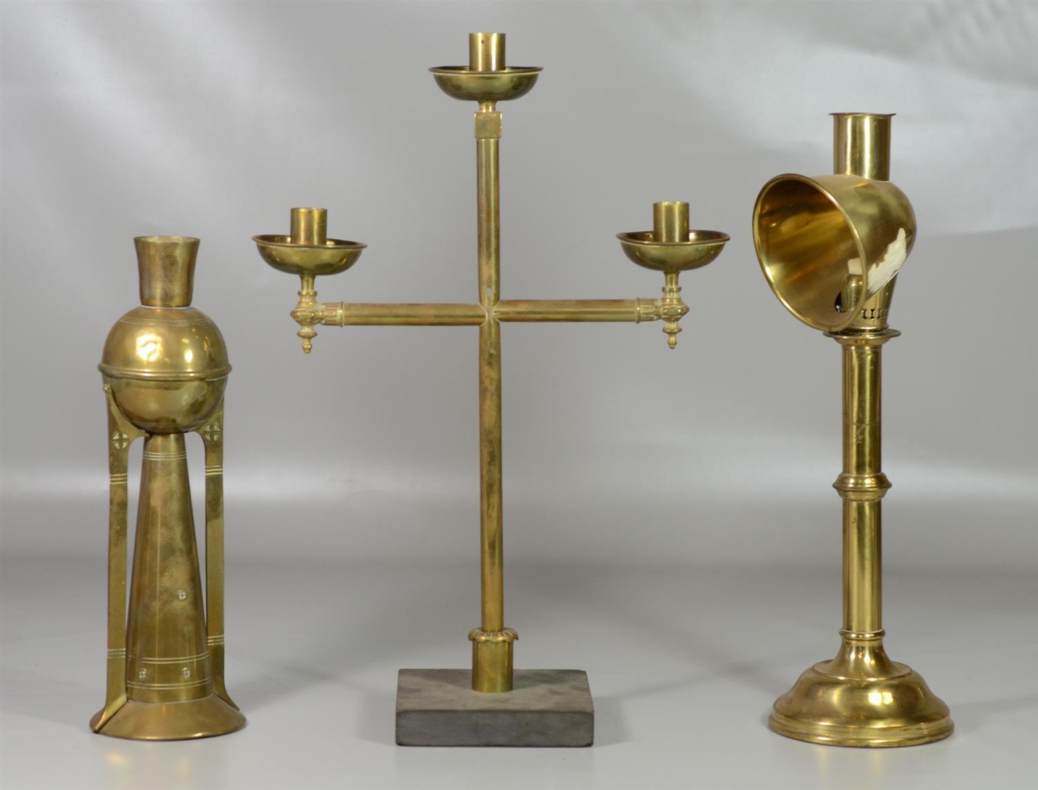 Appraisal: Brass lighting devices brass arm cruciform candleholder height ' '