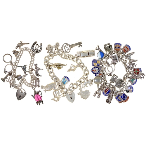 Appraisal: Three silver charm bracelets each with a collection of silver