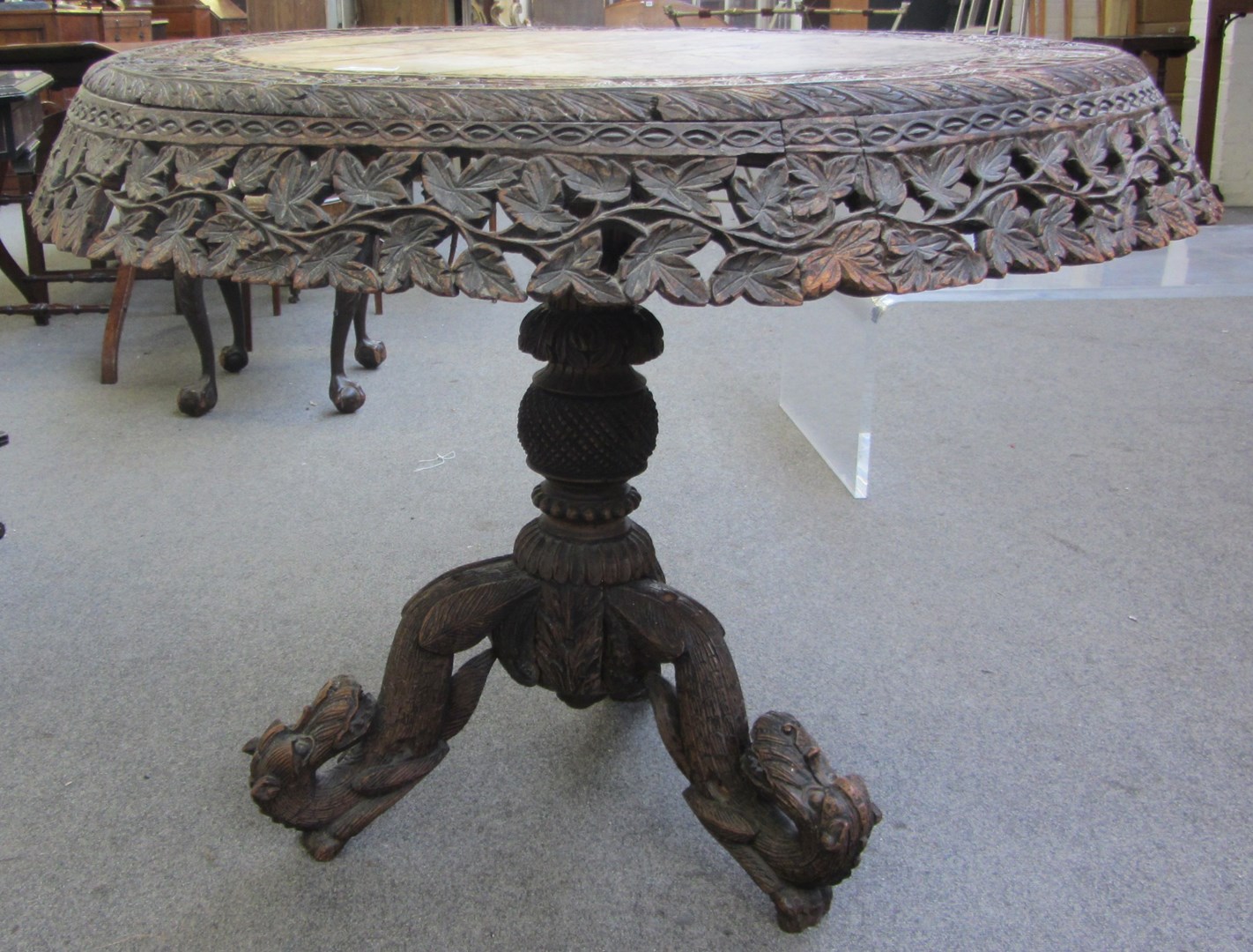 Appraisal: A th century Anglo-Eastern carved hardwood circular tripod table cm