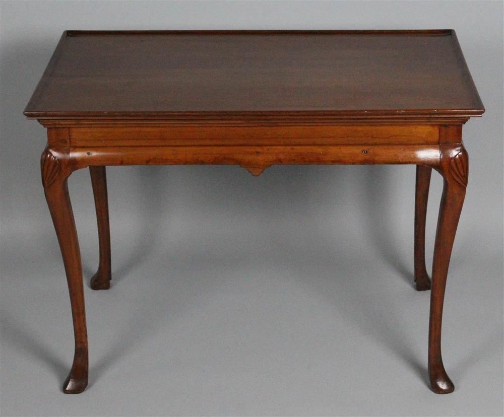 Appraisal: QUEEN ANNE CARVED CHERRYWOOD TEA TABLE having a rectangular form