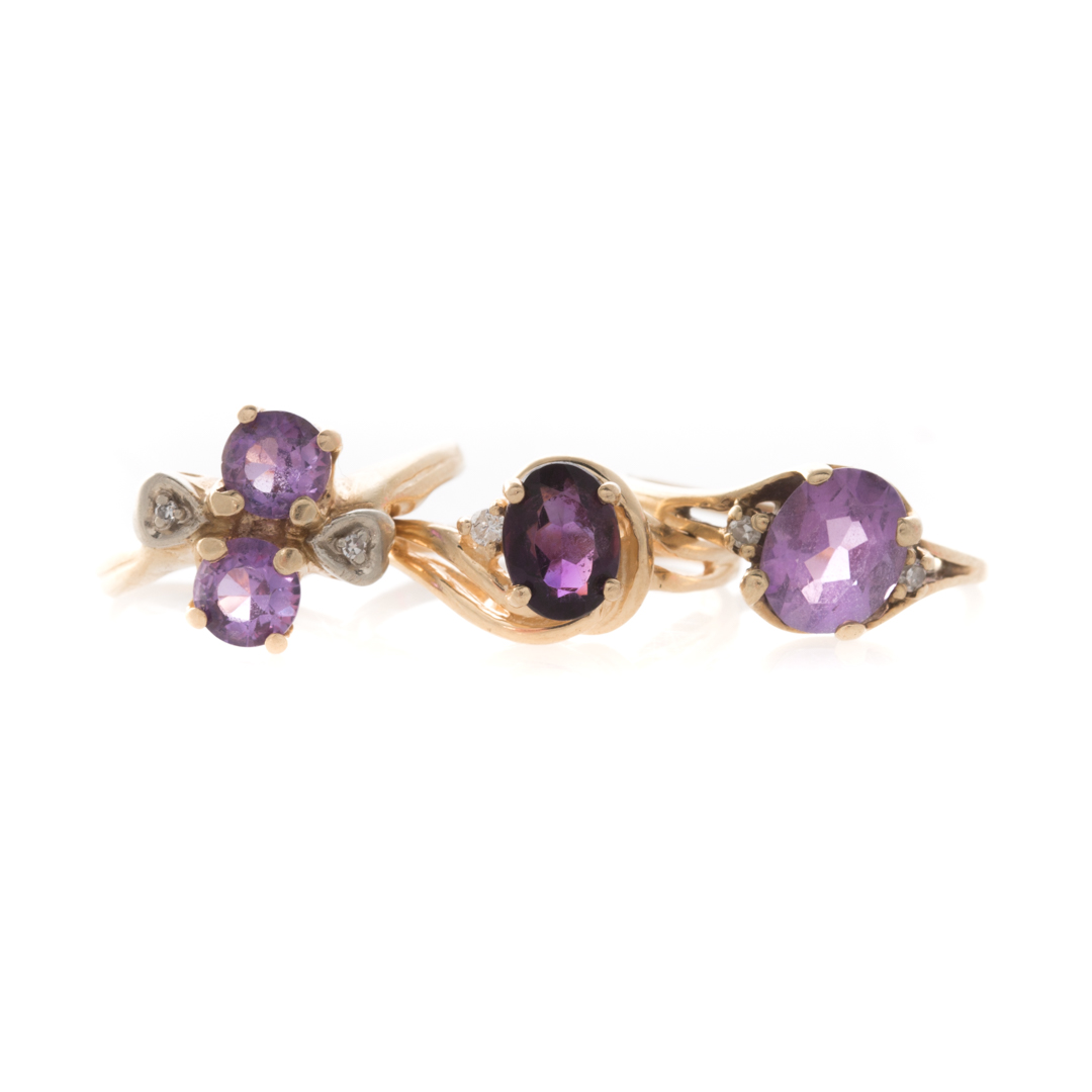 Appraisal: A Trio of Lady's Gold Amethyst Rings K yellow gold