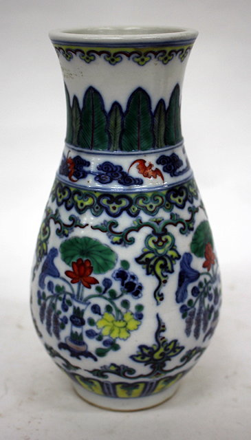 Appraisal: AN ORIENTAL PORCELAIN WUCAI VASE of baluster form with six