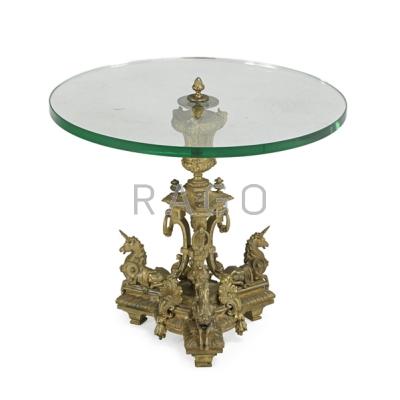 Appraisal: BRONZE BASE OCCASIONAL TABLE Glass top the base decorated with