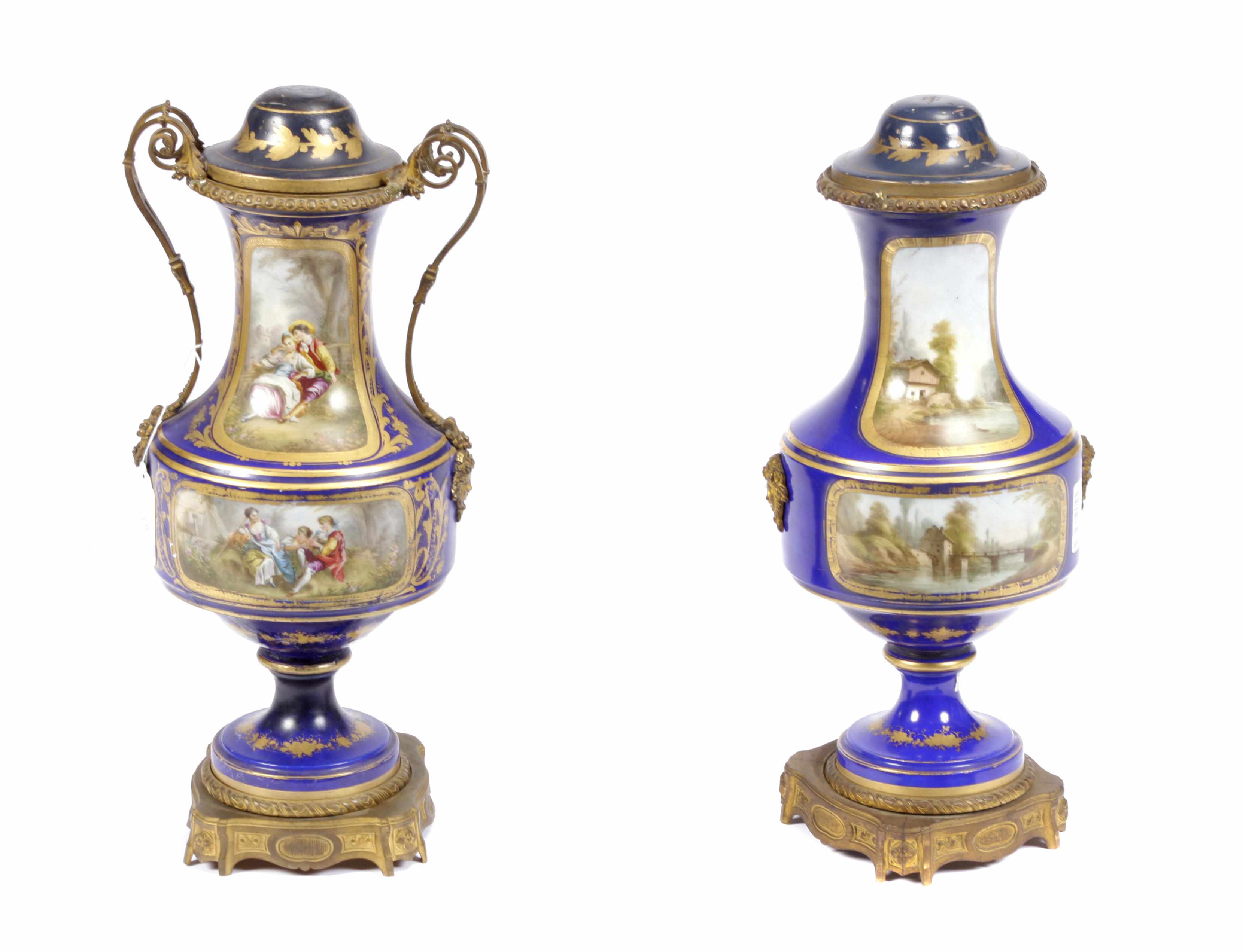 Appraisal: A pair of Svres style gilt bronze mounted porcelain covered