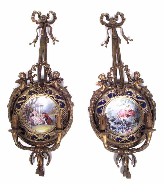 Appraisal: A pair of Louis XV style gilt bronze and porcelain