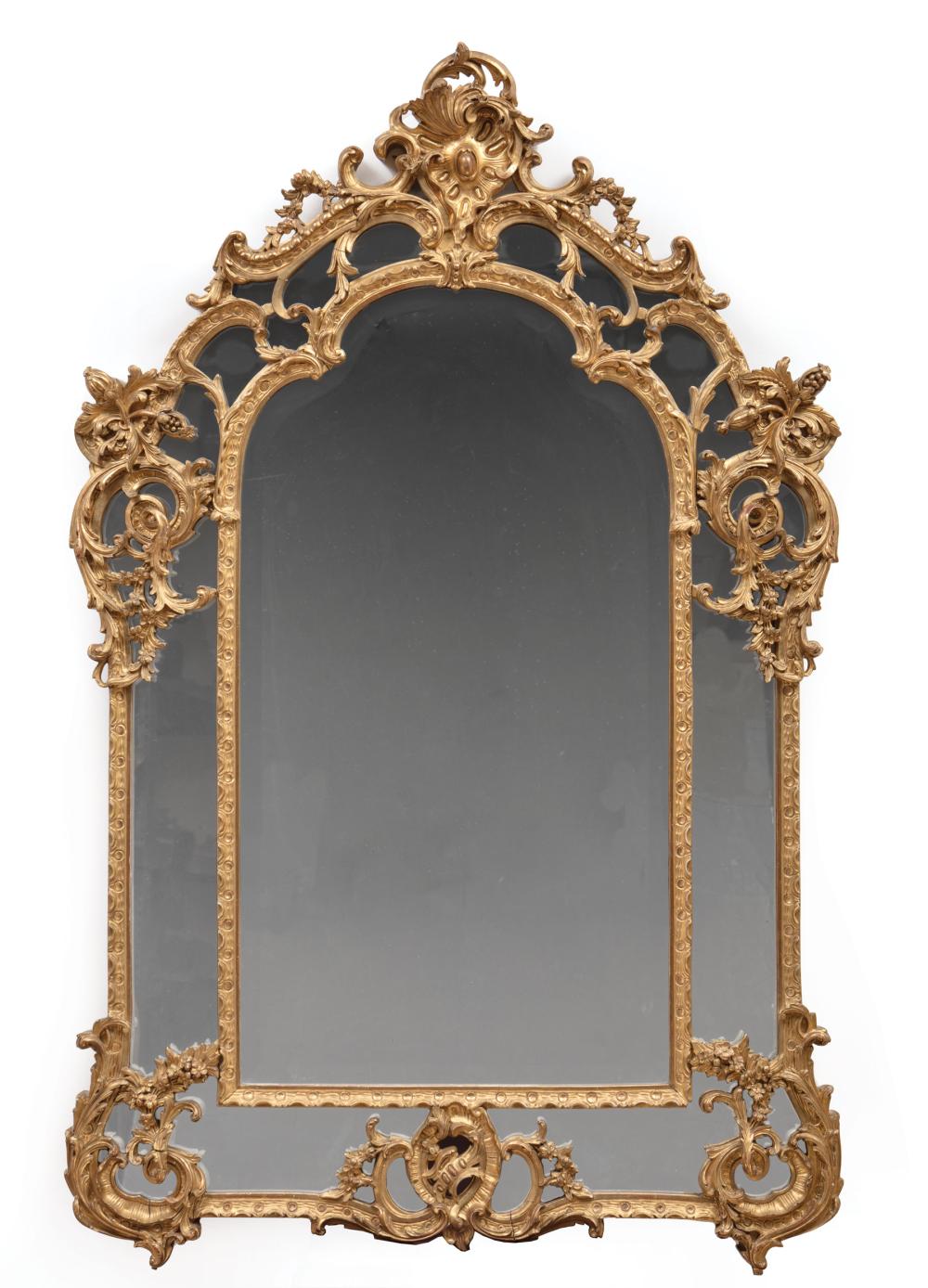 Appraisal: R gence-Style Carved Giltwood Mirror probably late th c rocaille