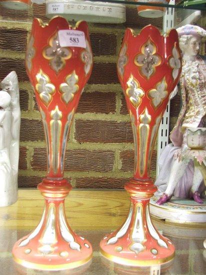 Appraisal: A PAIR OF BOHEMIAN PINK GLASS TULIP VASES with baluster