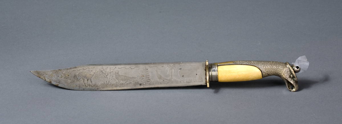 Appraisal: SILVER MOUNTED EAGLE HEAD BOWIE KNIFE WITH ENGRAVED BLADE The