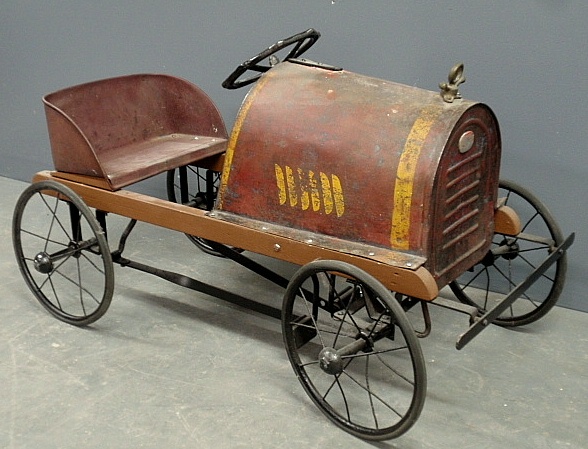 Appraisal: - Child s metal pedal car- a copy of an