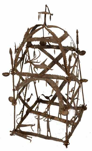 Appraisal: A FOLK ART WROUGHT IRON HANGING ORNAMENT decorated with birds