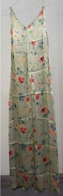 Appraisal: Evening dress in floral printed pale aqua some stains with