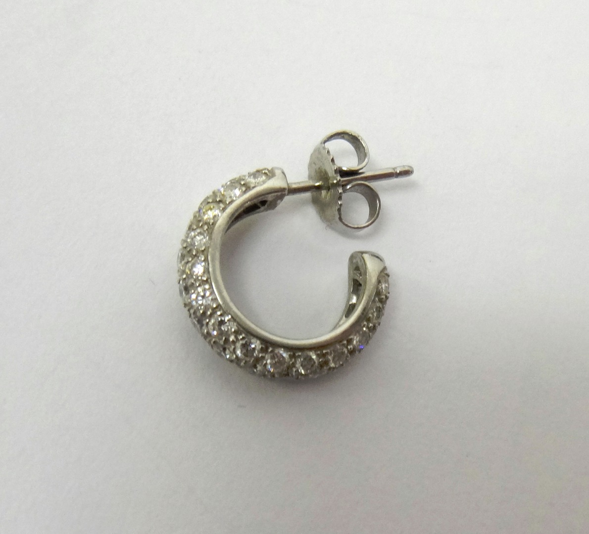 Appraisal: A Tiffany Co Platinum and diamond set single earring in