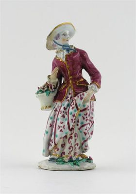 Appraisal: A Bow figure of a lady wearing a maroon jacket