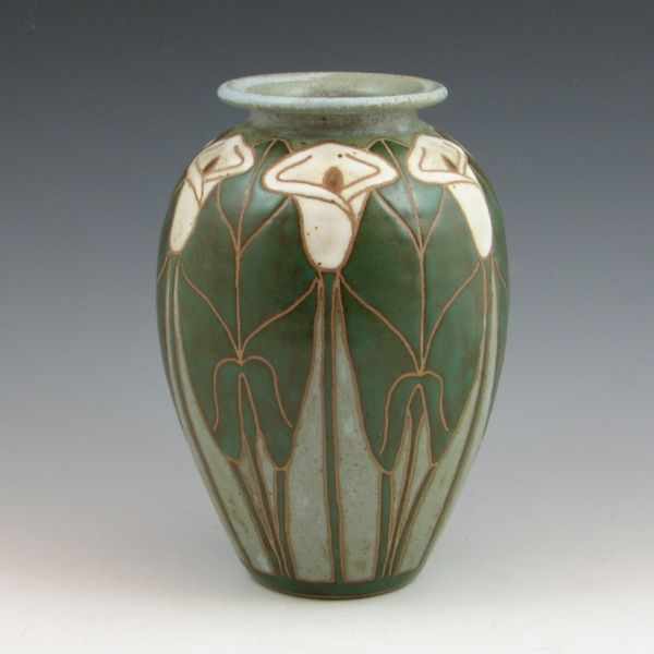 Appraisal: Eric Olson vase with calla lilies from Signed Eric Olson