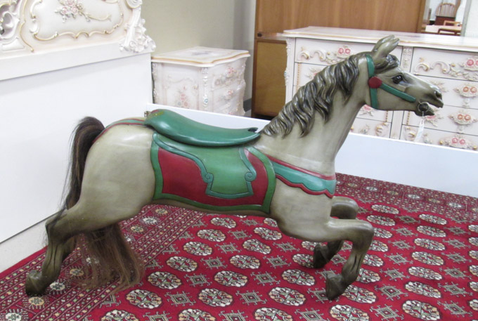 Appraisal: CARVED AND PAINTED CAROUSEL HORSE an inside row jumper with