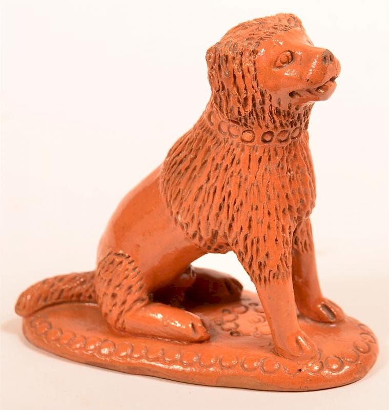 Appraisal: th Century Redware Figure of a Seated Dog th Century