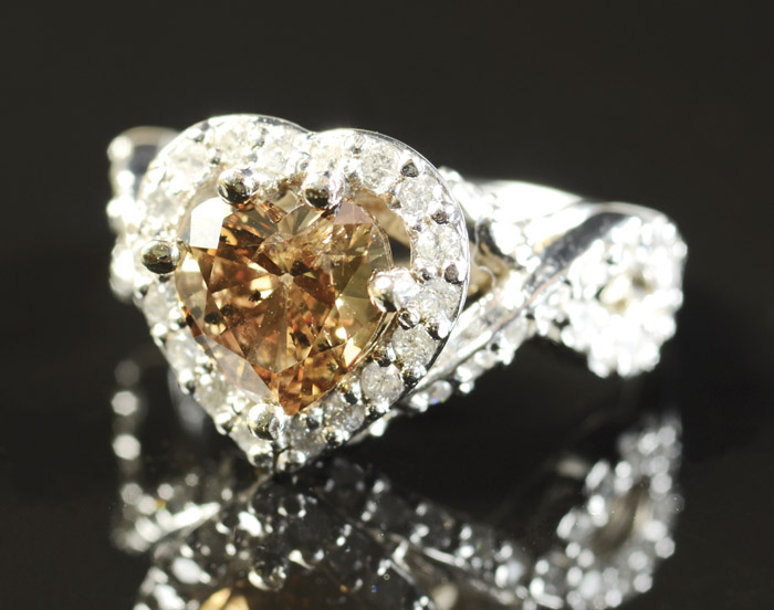 Appraisal: FANCY BROWN DIAMOND AND FOURTEEN KARAT GOLD RING with appraisal