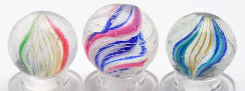 Appraisal: Lot of Ribbon Swirl Marbles Description Includes two complex core