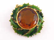 Appraisal: A yellow metal tests carat gold and green enamel pendant