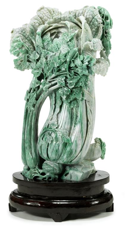 Appraisal: Massive Chinese carved mottled green jadeite cabbage modelTall leafy vegetable