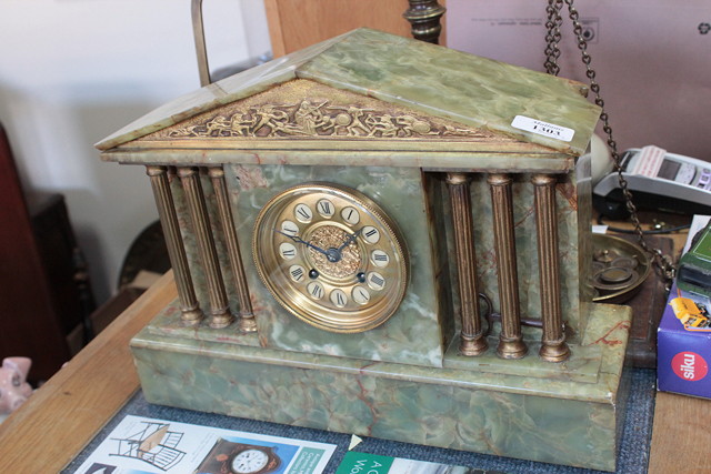 Appraisal: AN ONYX MANTEL CLOCK of classical architectural form the gilt