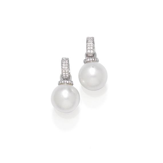 Appraisal: PEARL AND DIAMOND EAR PENDANTS White gold and Fancy ear