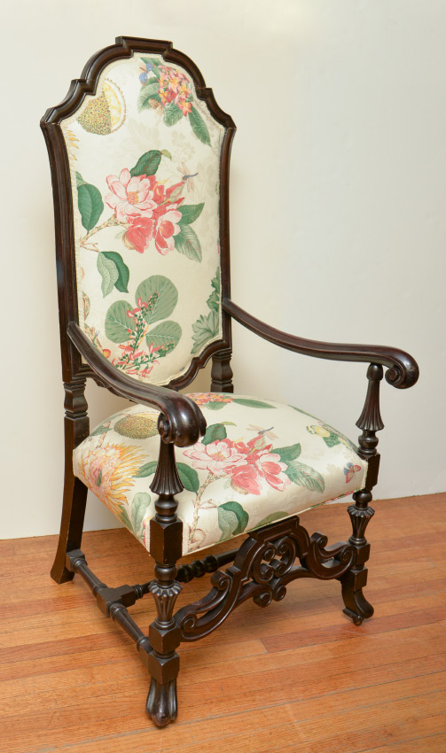 Appraisal: VICTORIAN CARVED TALL ARM CHAIR Shaped back and arms scroll