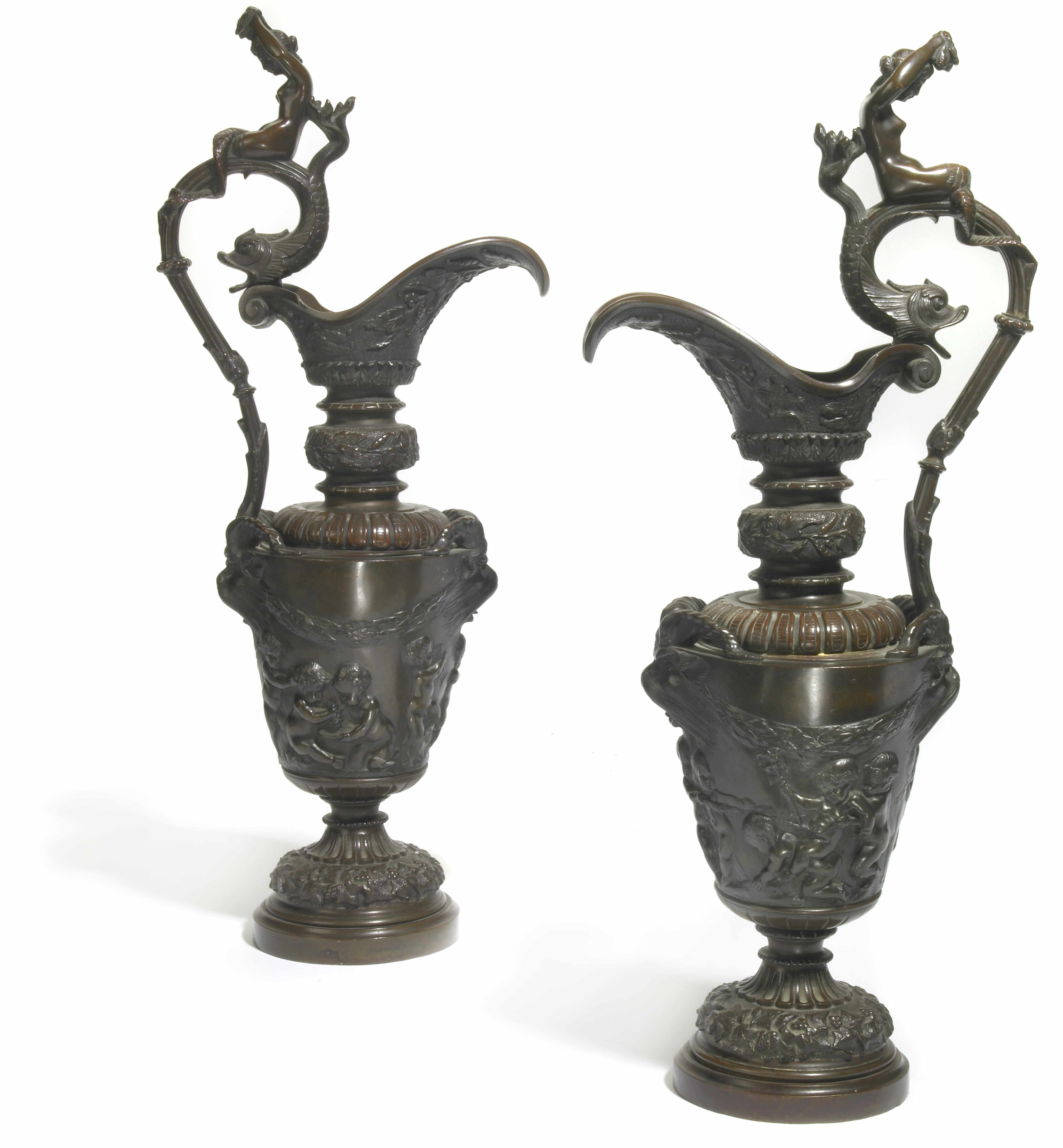 Appraisal: A pair of French Renaissance Revival patinated bronze ewers circa