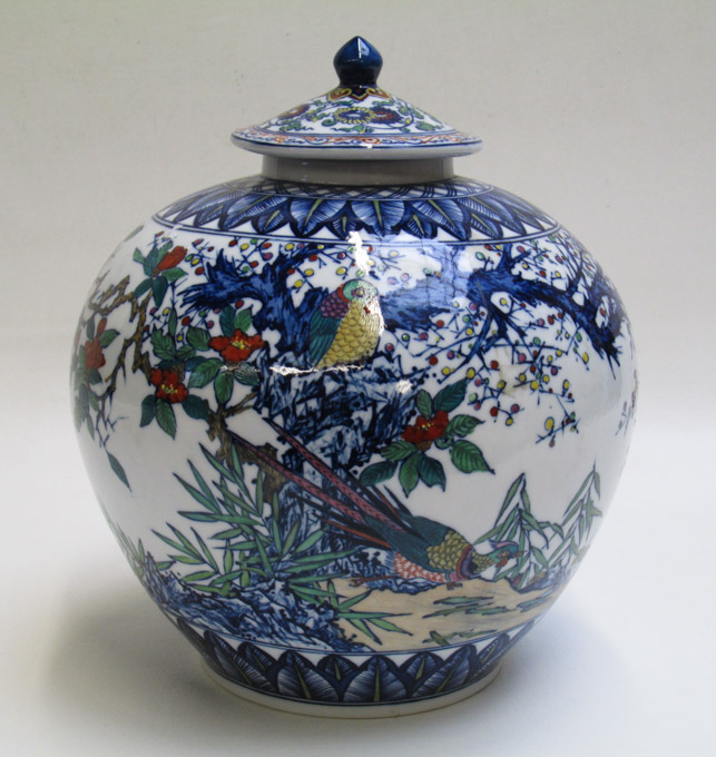 Appraisal: CHINESE HAND ENAMELED PORCELAIN COVERED JAR with colorful scenes of