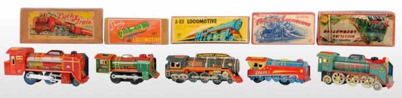 Appraisal: Lot of Tin Train Friction Toys Description Japanese Working All