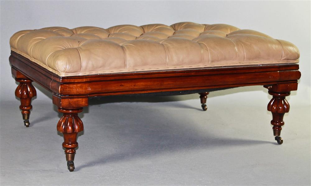 Appraisal: HENREDON TUFTED GEORGE IV STYLE LEATHER OTTOMAN with straight mahogany