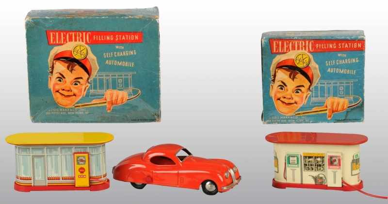 Appraisal: Lot of Tin Electric Filling Stations with Car Description German