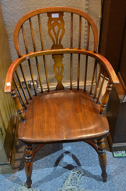 Appraisal: A pair of reproduction beechwood Windsor elbow chairseach with splat