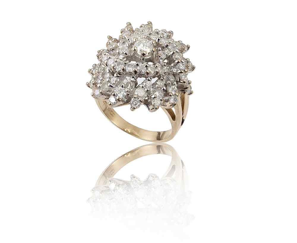 Appraisal: STARBURST DIAMOND COCKTAIL RING K white gold ring contains round