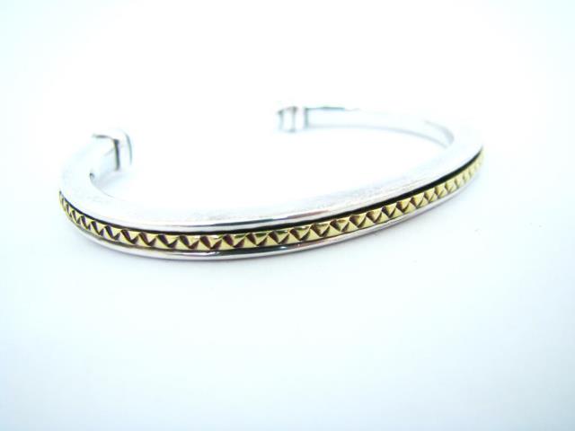 Appraisal: A Scott Kay sterling silver bracelet with K yellow gold