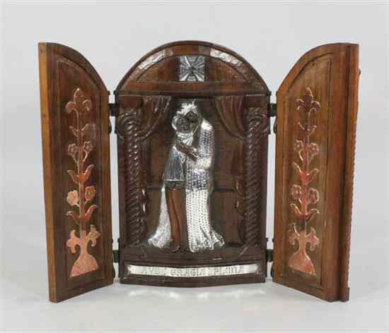 Appraisal: Clare Sheridan - A carved walnut triptych with applique silver