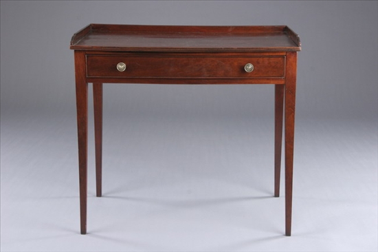 Appraisal: ENGLISH MAHOGANY WRITING TABLE th century Galleried rectangular top with