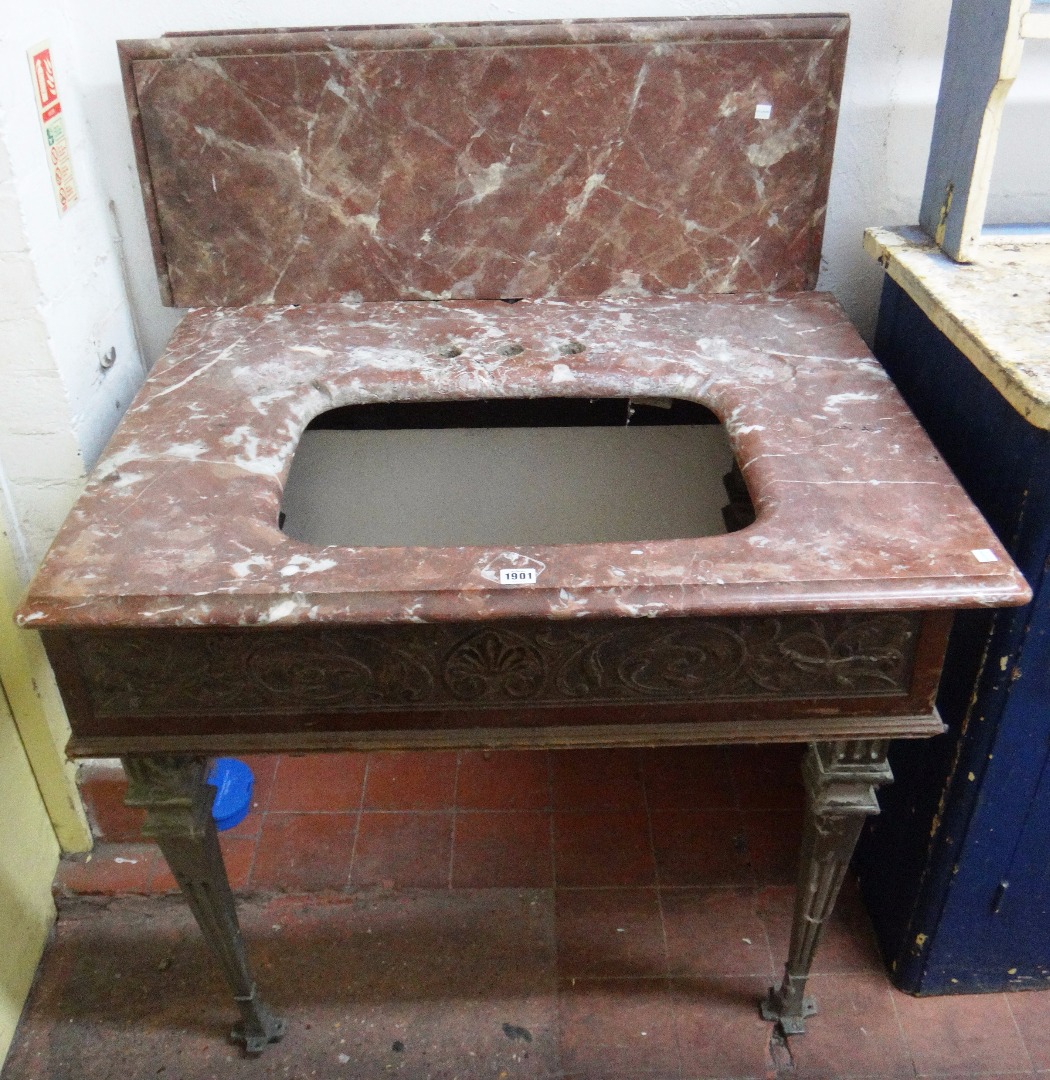 Appraisal: An early th century sink unit with rouge marble splash