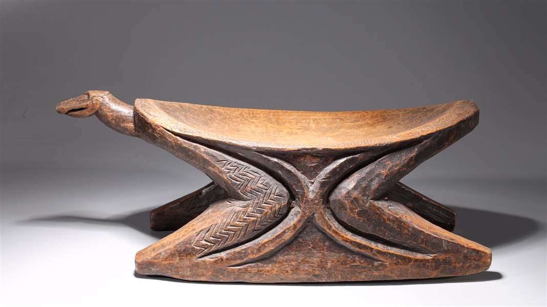 Appraisal: African wood tribal seat with carved details and animal head