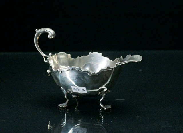 Appraisal: A sterling silver sauce boat maker George Nathan and Ridley