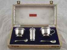 Appraisal: A boxed silver cruet set with Celtic style decoration complete