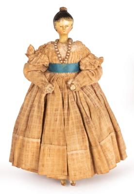 Appraisal: A Grodnertal th Century painted wooden doll with moulded hair