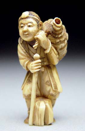 Appraisal: ANTIQUE IVORY NETSUKE Antique carved ivory netsuke a man standing