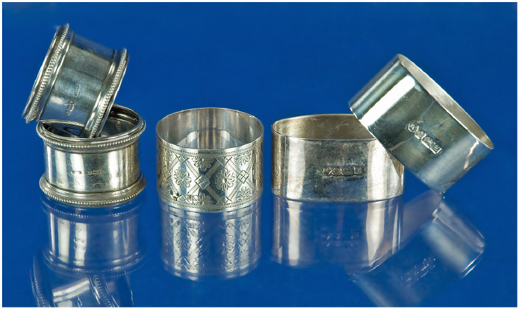 Appraisal: Collection of Five Silver Napkin Rings Two pairs and one