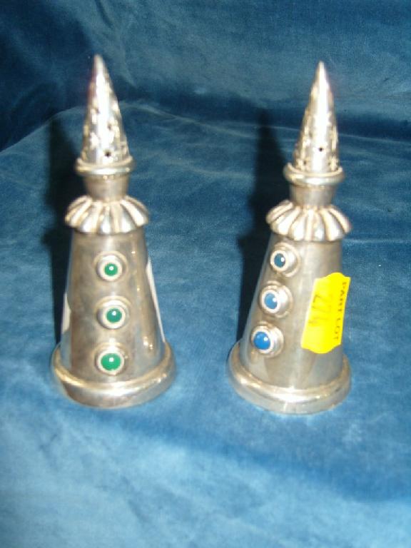 Appraisal: A pair of French silver plated pepper pots of conical