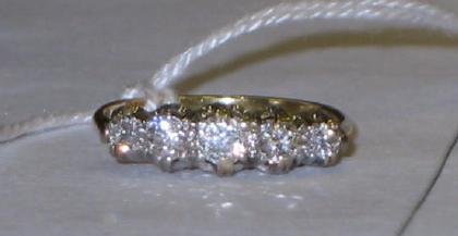 Appraisal: A FIVE STONE DIAMOND RING the brilliant cut stones claw