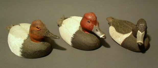 Appraisal: Three carved ducks by Brennan - ring-neck drake canvasback and